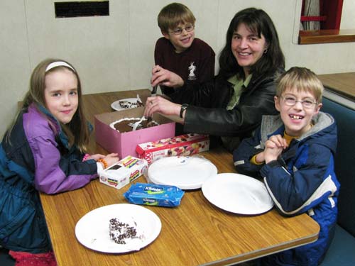 Ferry Eating Birthday Cake With Mom