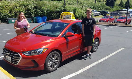 Brock behind the wheel lesson