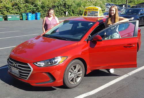 Maddy behind the wheel lesson